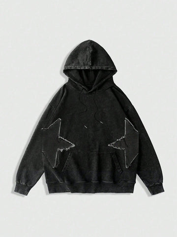 Women's plus size black hooded sweatshirt featuring a star pattern, long sleeves, drawstring hood, and front pocket in an oversized fit.