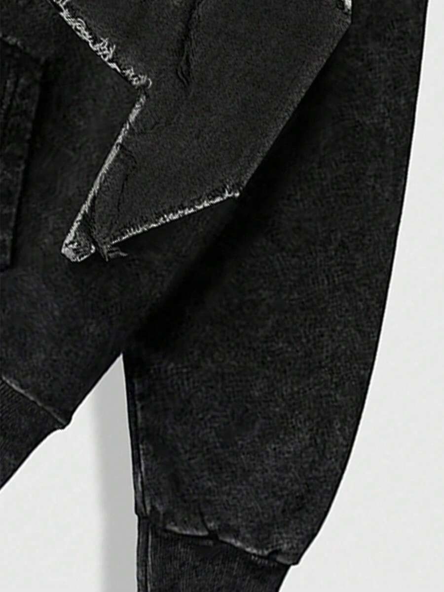 Women's plus size black hooded sweatshirt featuring a star pattern, long sleeves, drawstring hood, and front pocket in an oversized fit.