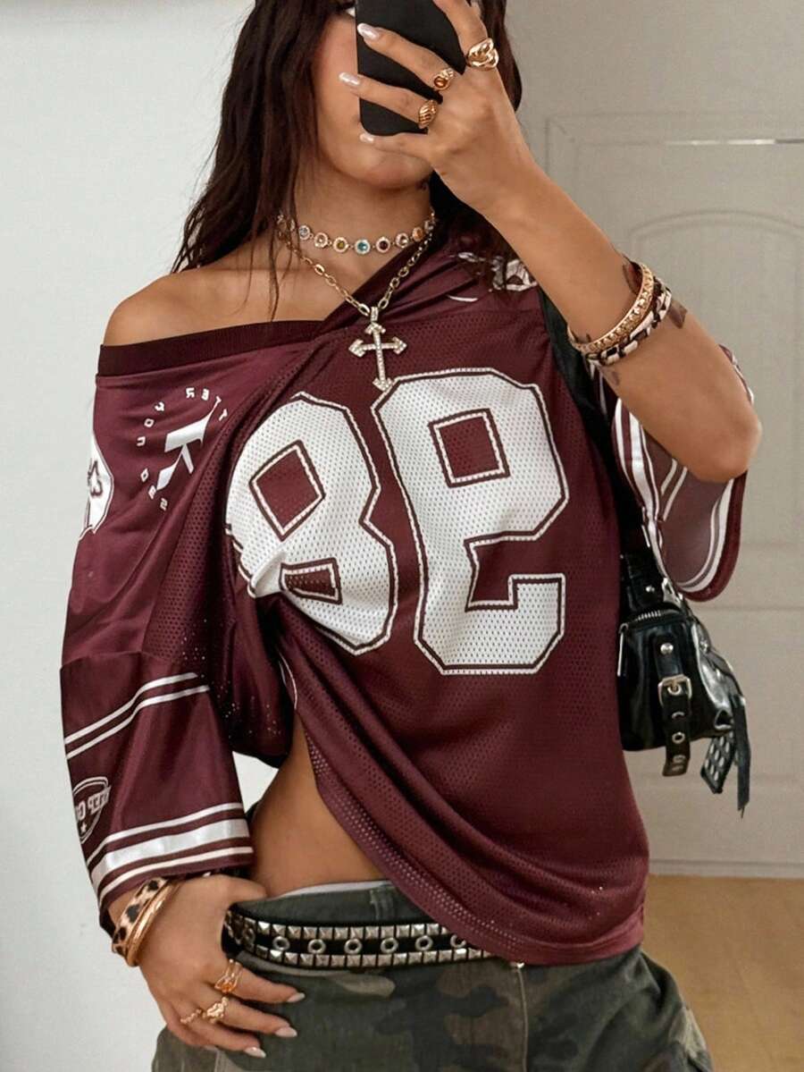 Women's oversized mesh jersey t-shirt with sporty number print, short drop-shoulder sleeves, and V-neckline.