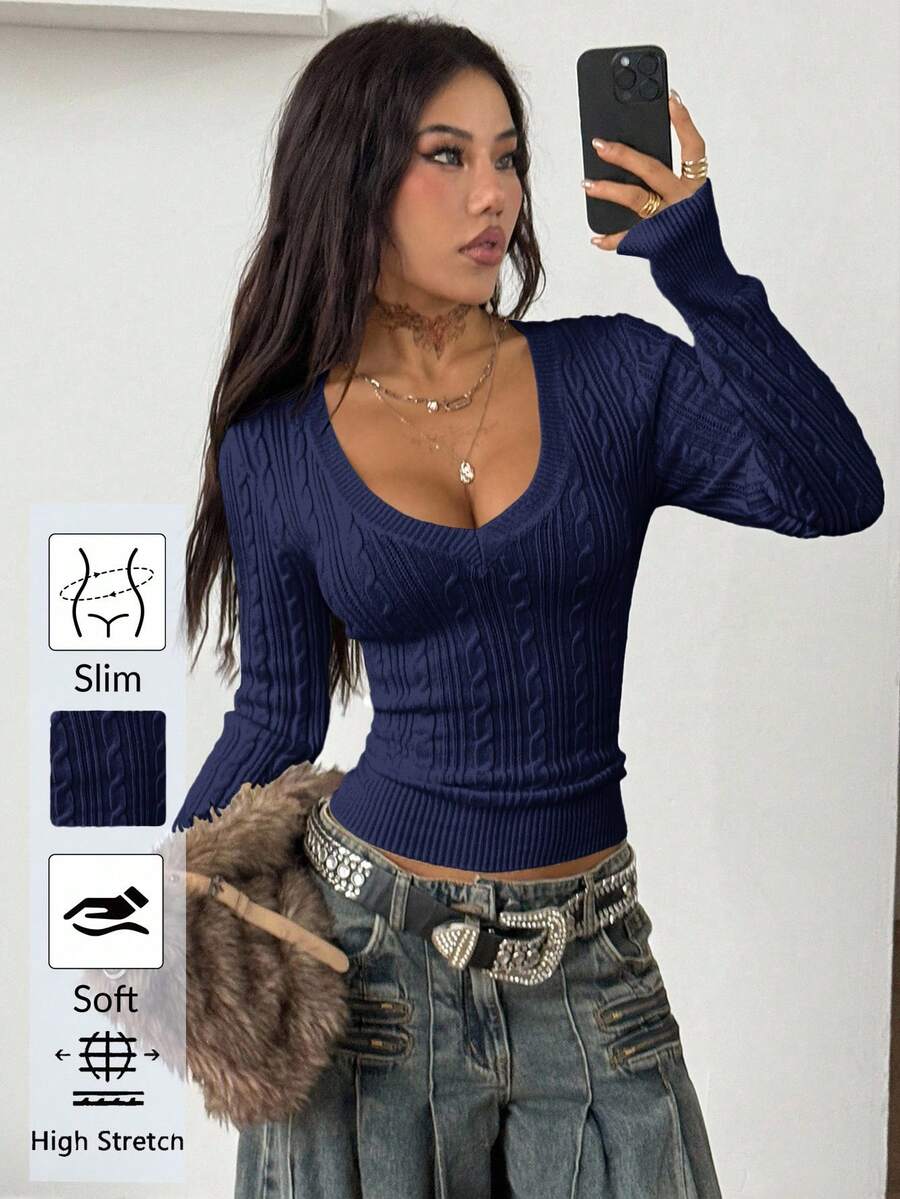Women's slim fit cable-knit sweater with a V-neckline and long sleeves in solid green rib knit fabric.
