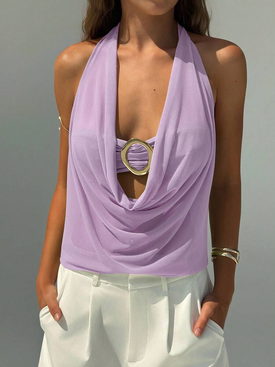 Semi-sheer plunging halter backless top with draped knot details and metallic decor, shown as a short slim-fit mesh going-out top.