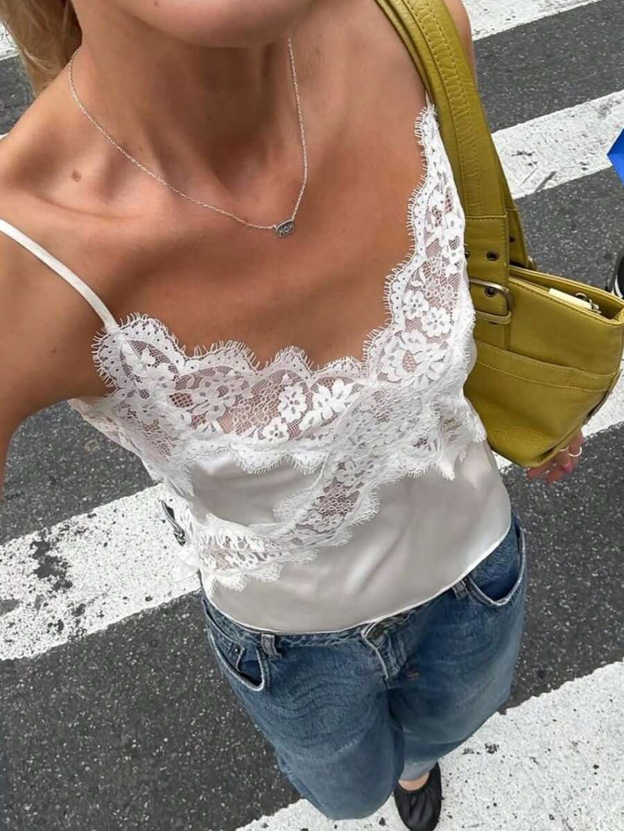 White satin design camisole tank top featuring contrast lace patchwork details and spaghetti straps.
