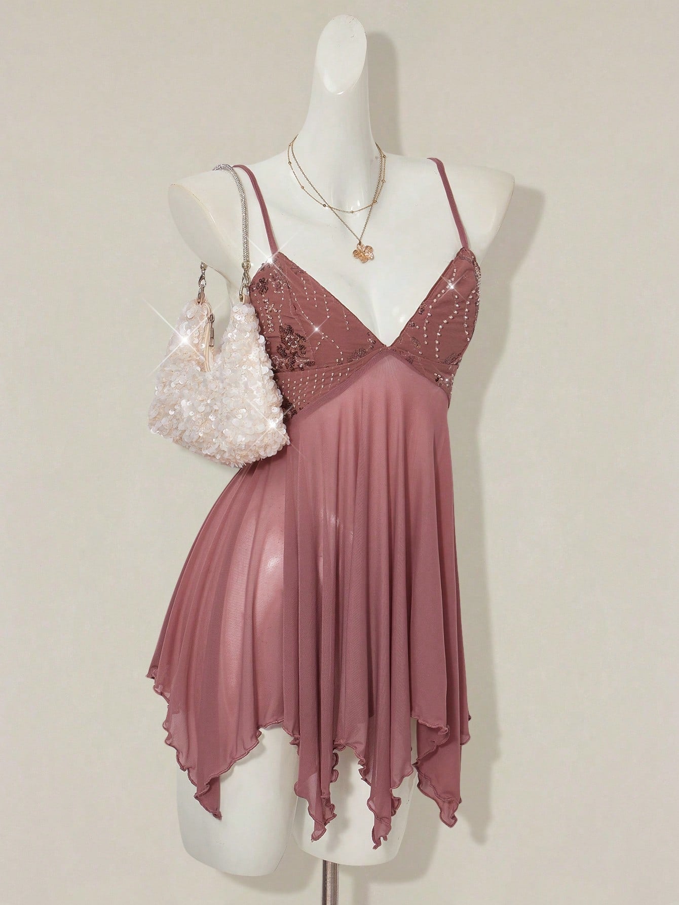 Women's sequin embroidered V-neck mini dress with spaghetti straps, mesh patchwork, slim bodycon fit, and asymmetrical ruffle hem