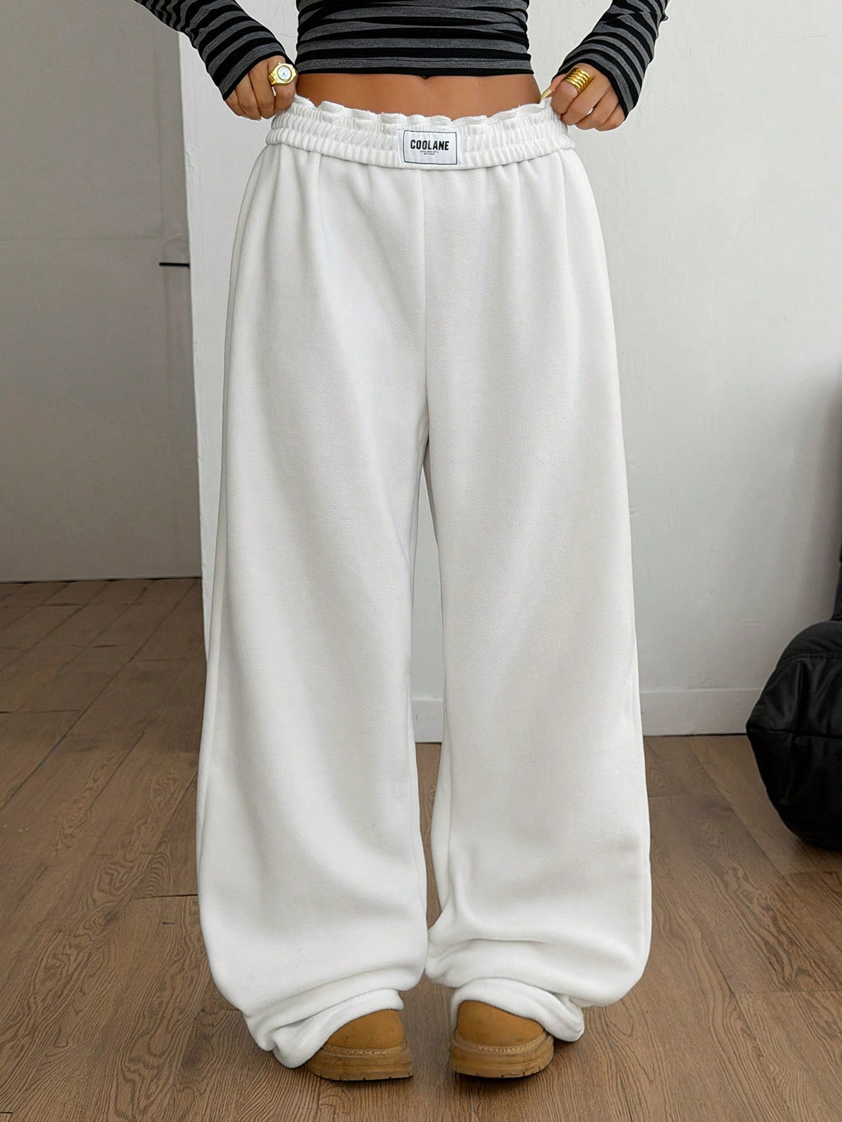 Women's striped straight leg casual trousers with elastic mid waist and side pockets