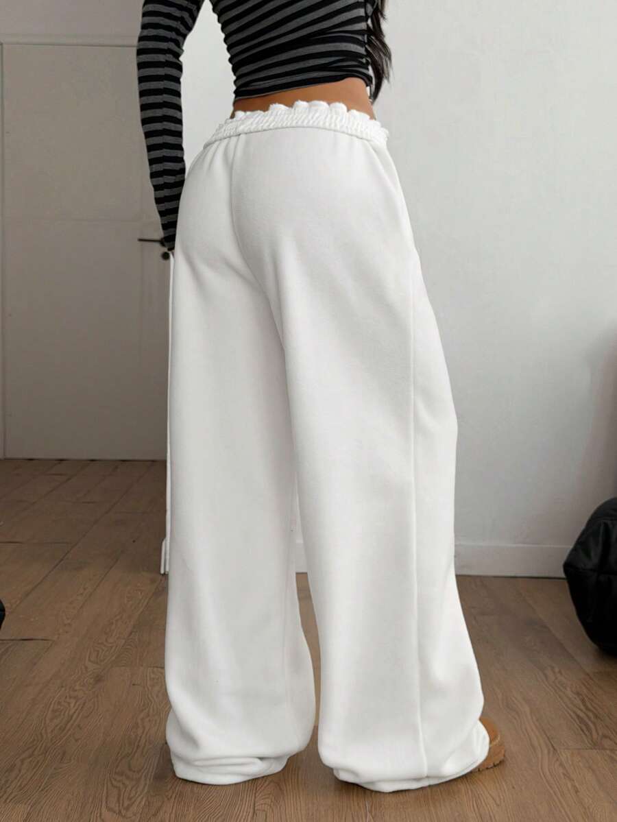 Women's striped straight leg casual trousers with elastic mid waist and side pockets