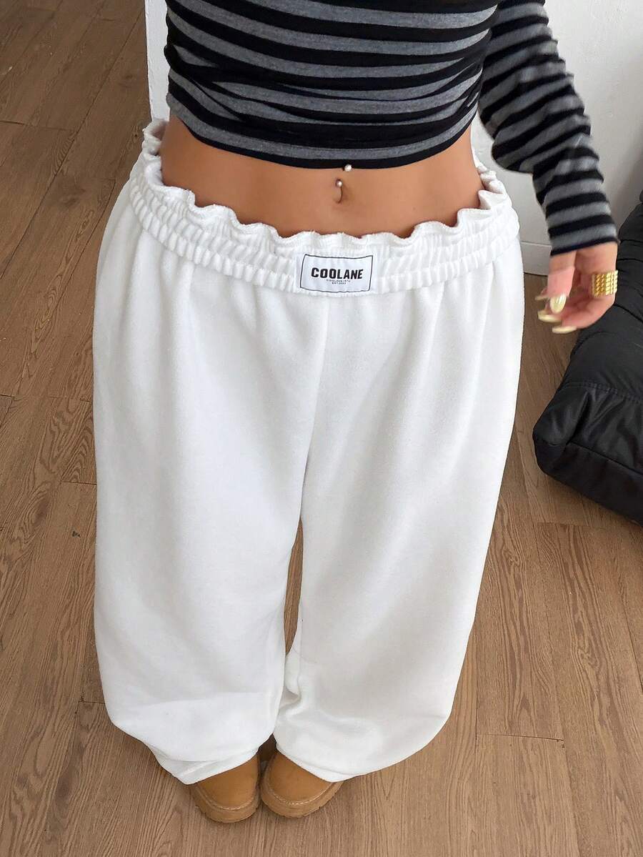 Women's striped straight leg casual trousers with elastic mid waist and side pockets