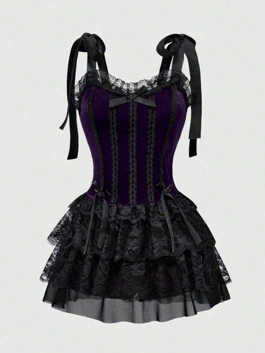 Gothic velvet halter mini dress with contrast lace trim, bow detail, lace-up accents, arm sleeves, layered hem, and cross pendant.