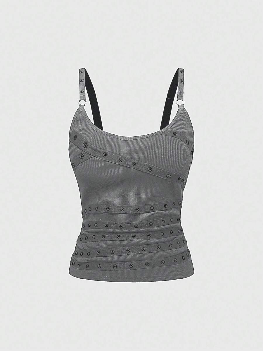 Women's wide-strap cami top featuring a grunge punk design with cut-out details, rhinestone embellishments, and grommet eyelets.