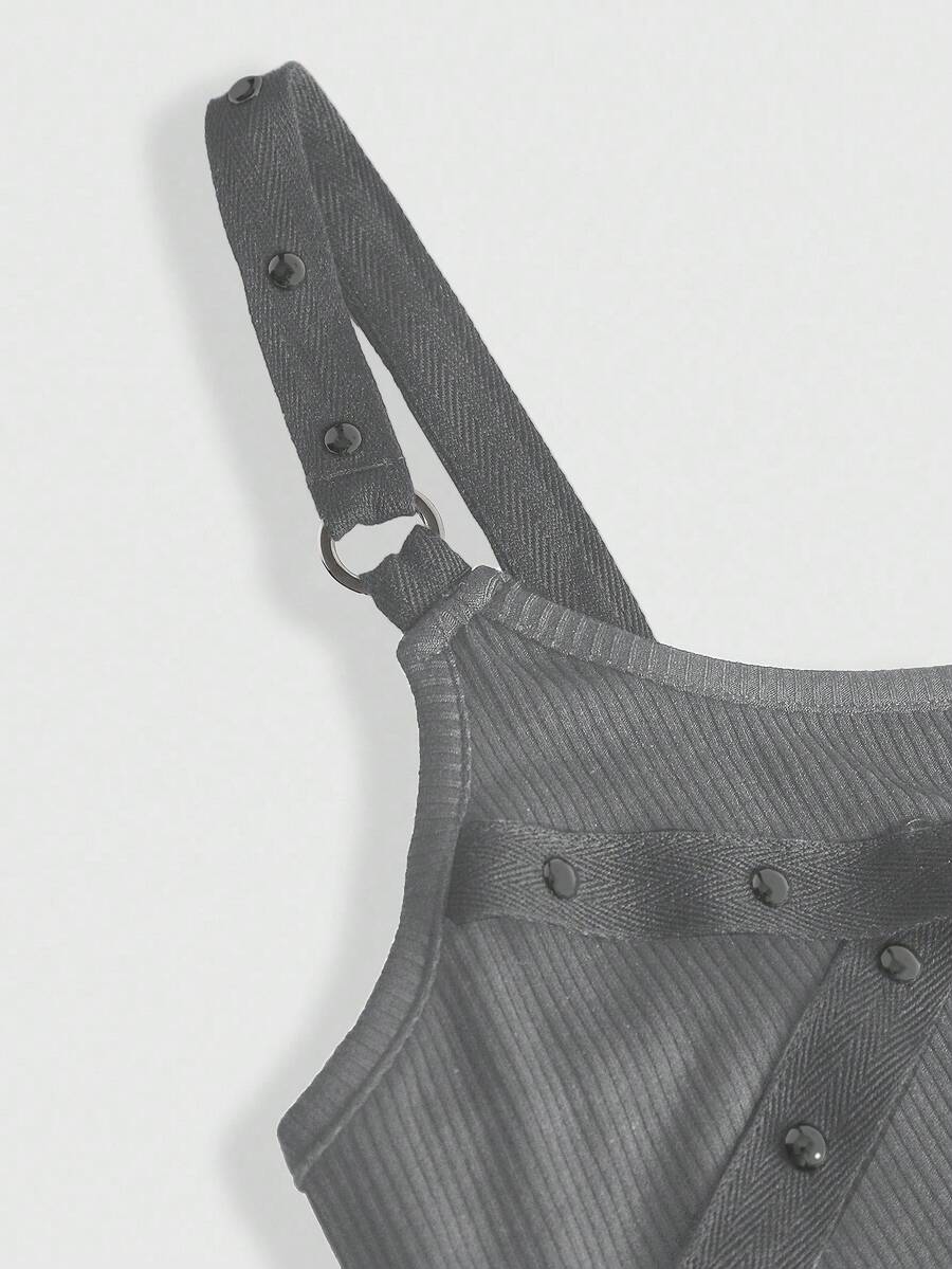 Women's wide-strap cami top featuring a grunge punk design with cut-out details, rhinestone embellishments, and grommet eyelets.