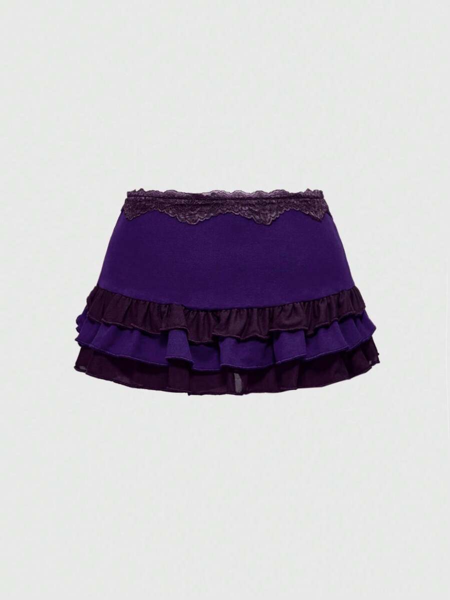 Women's black low-waist mini skirt with drawstring tie, ruched details, lace trim, layered ruffle hem, and asymmetric styling