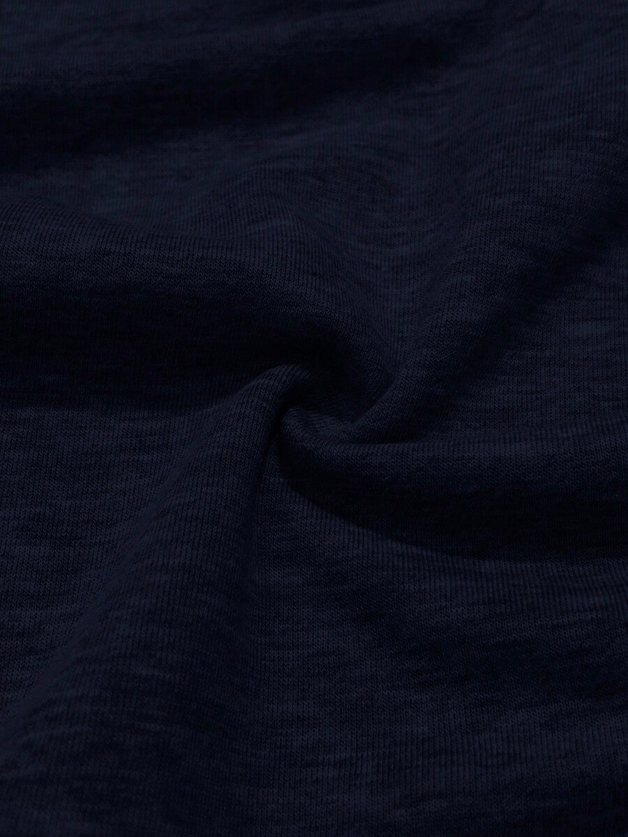 Women's casual long sleeve pullover sweatshirt with bishop sleeves and rib-knit detailing in navy blue.