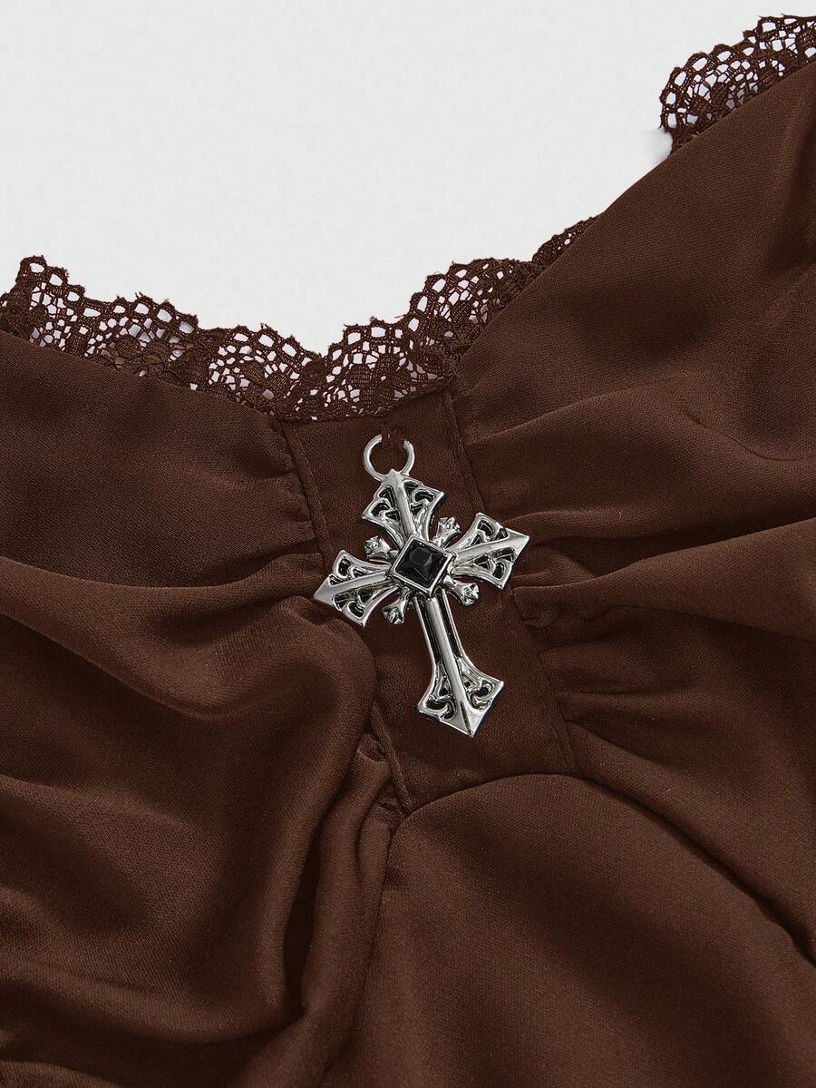 Women's vintage gothic cami dress with high-waist lace-up detail, spaghetti straps, zipper closure, and an asymmetrical knee-length hem.