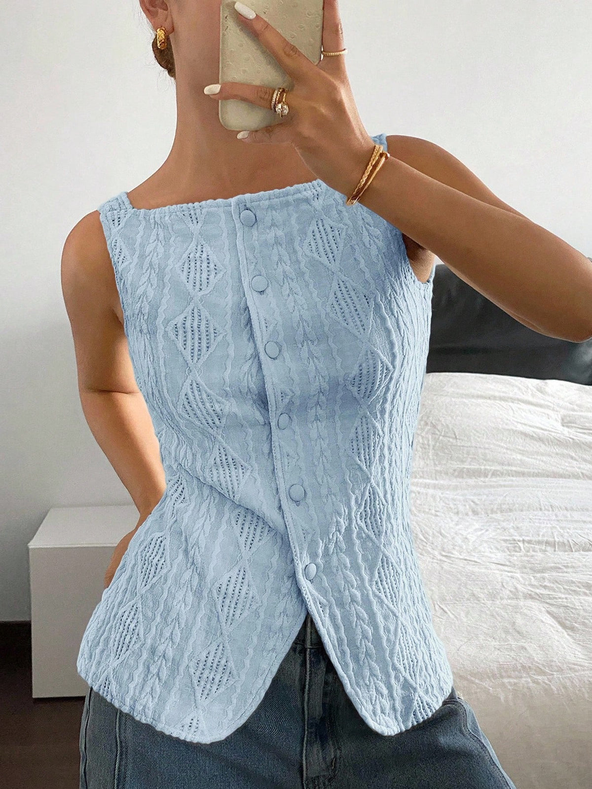Striped ribbed knit tank top for women featuring a button-down front, sleeveless design, and slim fit silhouette.