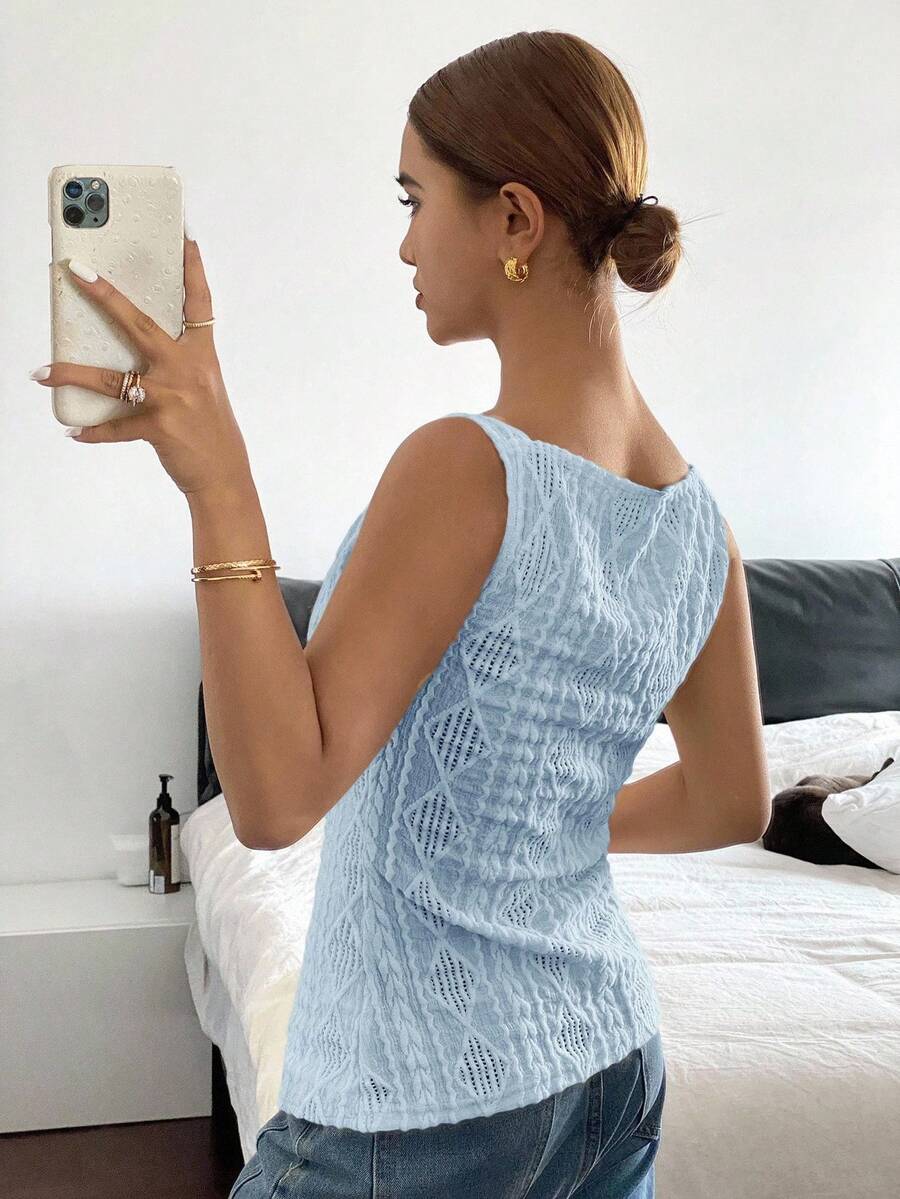 Striped ribbed knit tank top for women featuring a button-down front, sleeveless design, and slim fit silhouette.