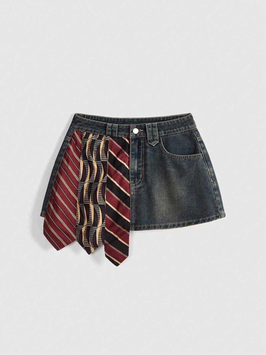Women's low-waist asymmetrical mini skort featuring button, zipper, and pocket details in an A-line cut.
