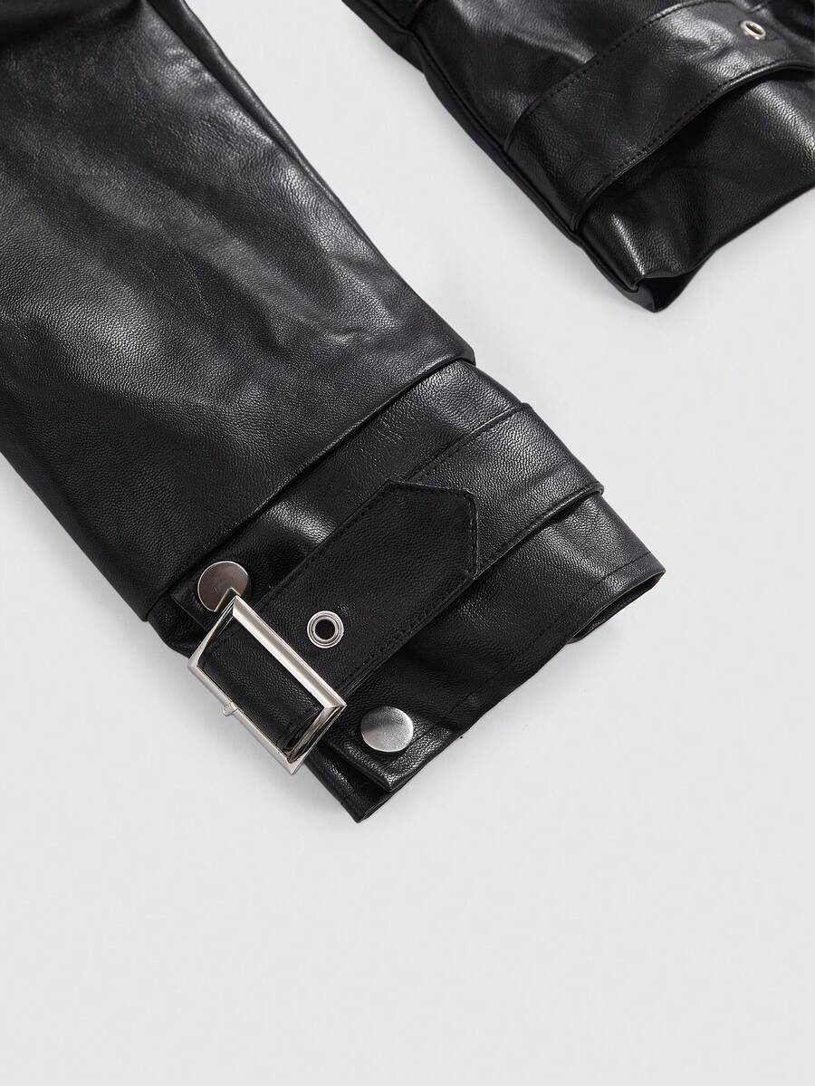 Women's black grunge punk motorcycle jacket featuring metal buckle straps and asymmetrical hem