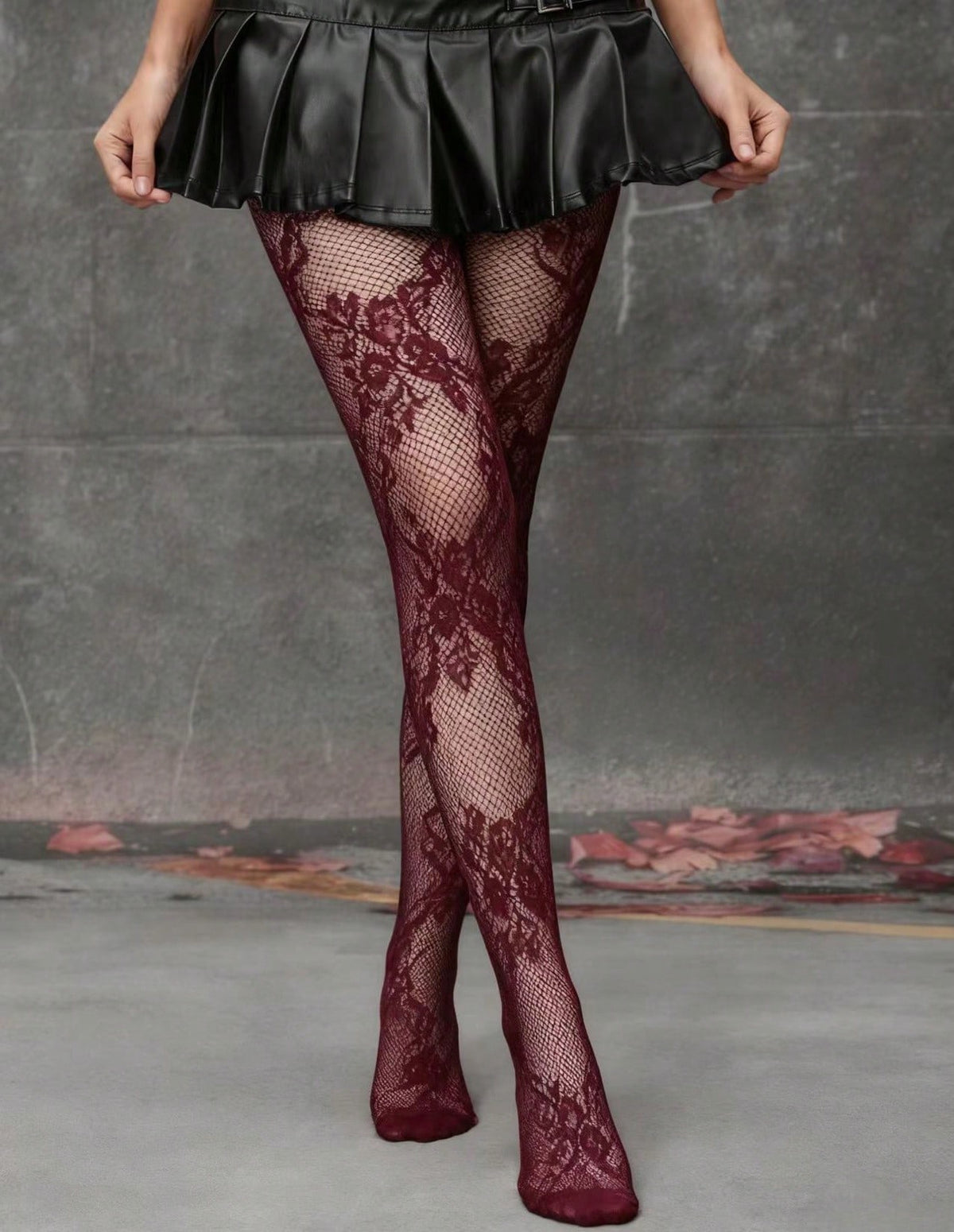 Women's floral fishnet tights with baroque hollow-out pattern in stretch knit fabric.