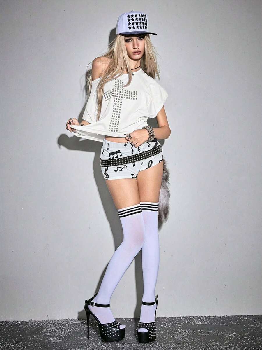 Women's grunge punk style short sleeve t-shirt featuring an asymmetrical neckline, hollow-out cut detail, and relaxed batwing sleeves in a soft cotton stretch fabric.