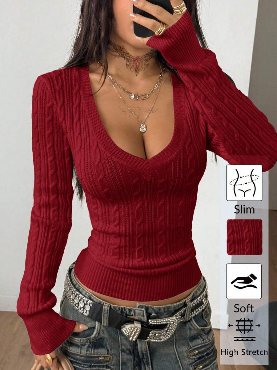Women's slim fit cable-knit sweater with a V-neckline and long sleeves in solid green rib knit fabric.