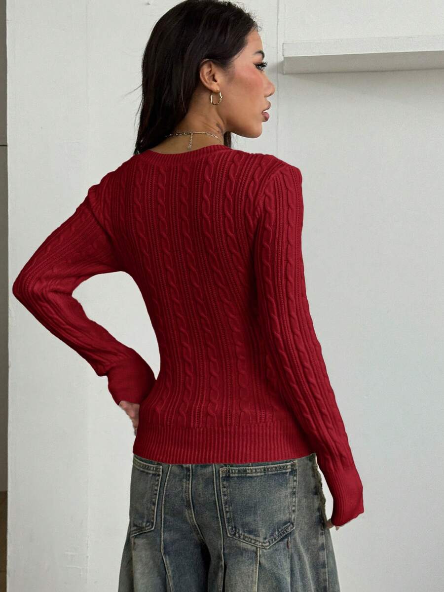 Women's slim fit cable-knit sweater with a V-neckline and long sleeves in solid green rib knit fabric.