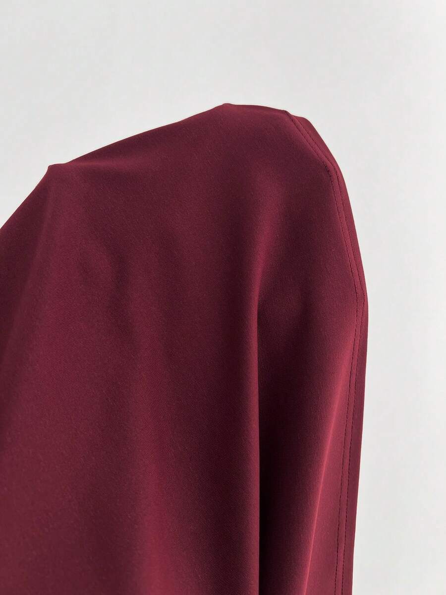 Women's short sleeve V-neck T-shirt featuring a front twist knot detail and slim fit.