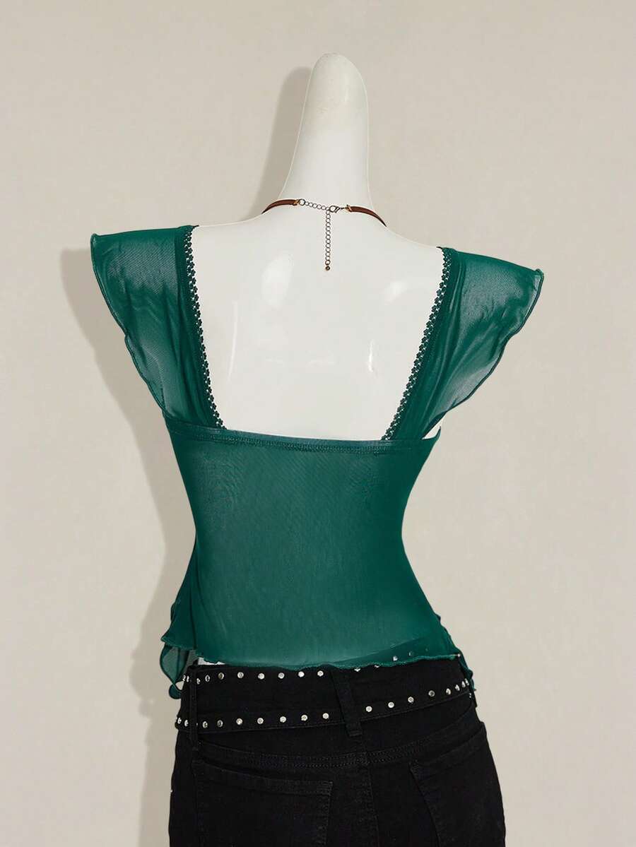Black slim fit women's ruched front camisole tank top featuring contrast mesh inserts, square neckline, and an asymmetrical crop hem.
