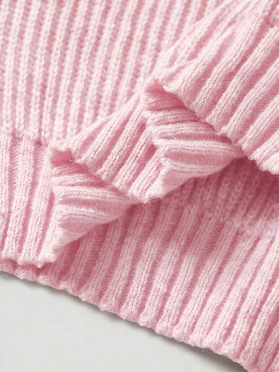 Women's rib-knit crop turtleneck sweater with long drop shoulder sleeves