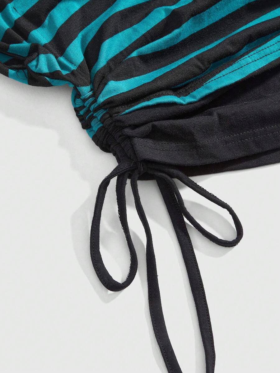 Women's striped t-shirt featuring an asymmetric cold shoulder neckline, batwing short sleeves, and ruched drawstring details in a loose knit fit.