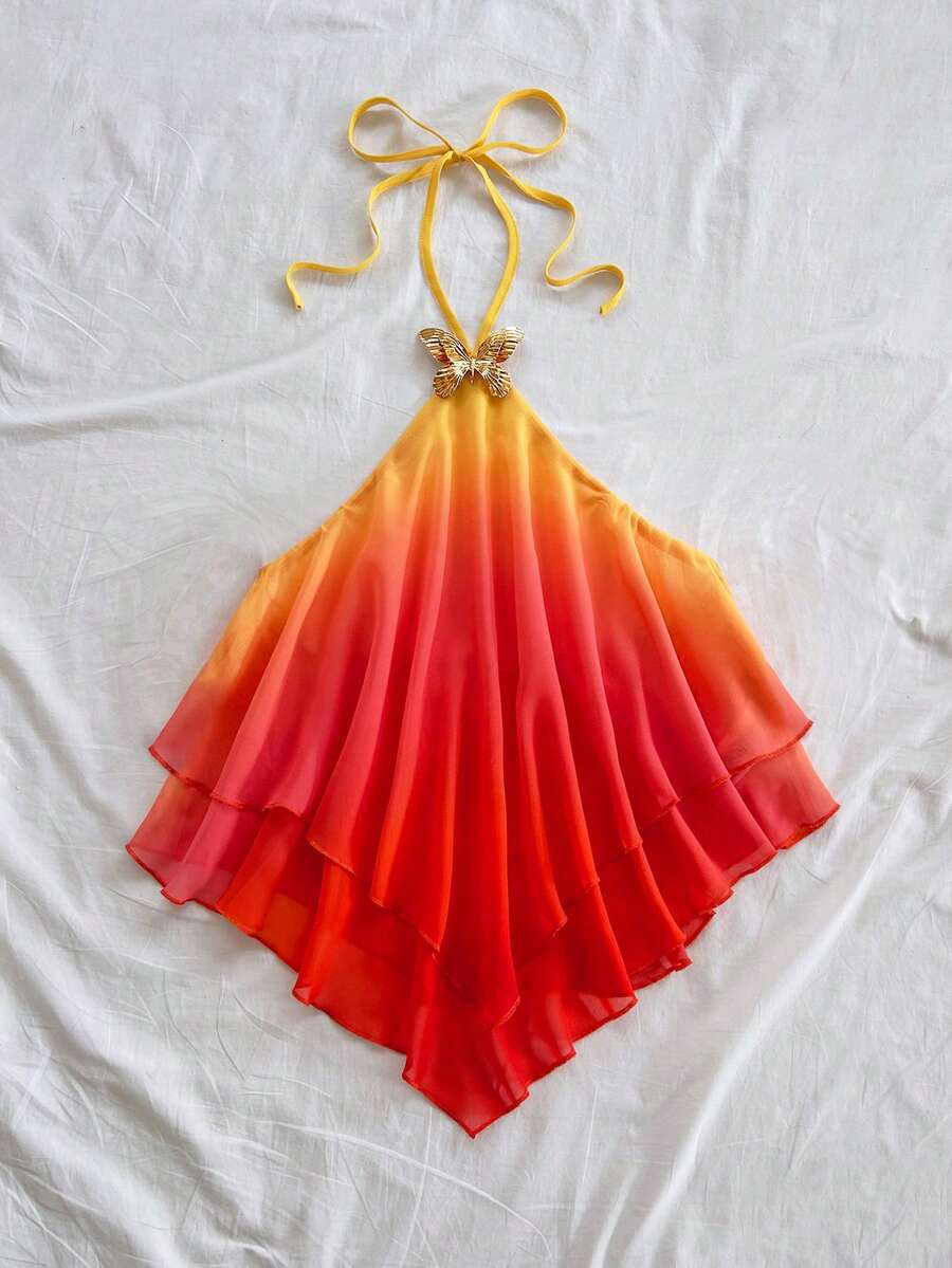 Women's gradient halter top with draped neck, butterfly metal accent, backless cut, and asymmetrical hem