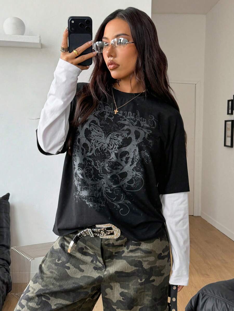 Women's casual graphic long sleeve t-shirt with a round neck, drop shoulder sleeves, and loose relaxed fit.