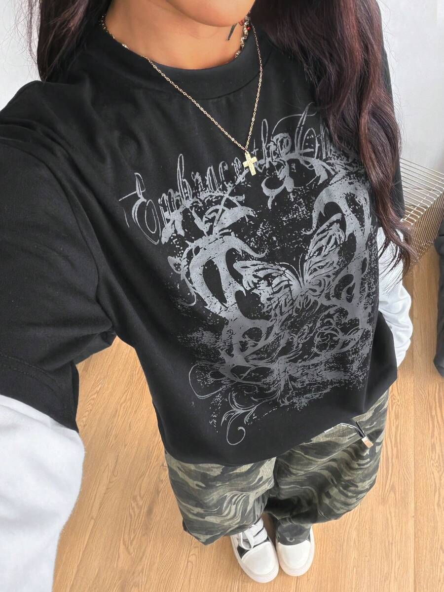 Women's casual graphic long sleeve t-shirt with a round neck, drop shoulder sleeves, and loose relaxed fit.