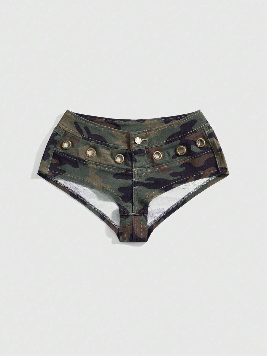 Women's ultra low waist camouflage mini skort shorts with zipper fly, button detail, and grommet eyelet accents.