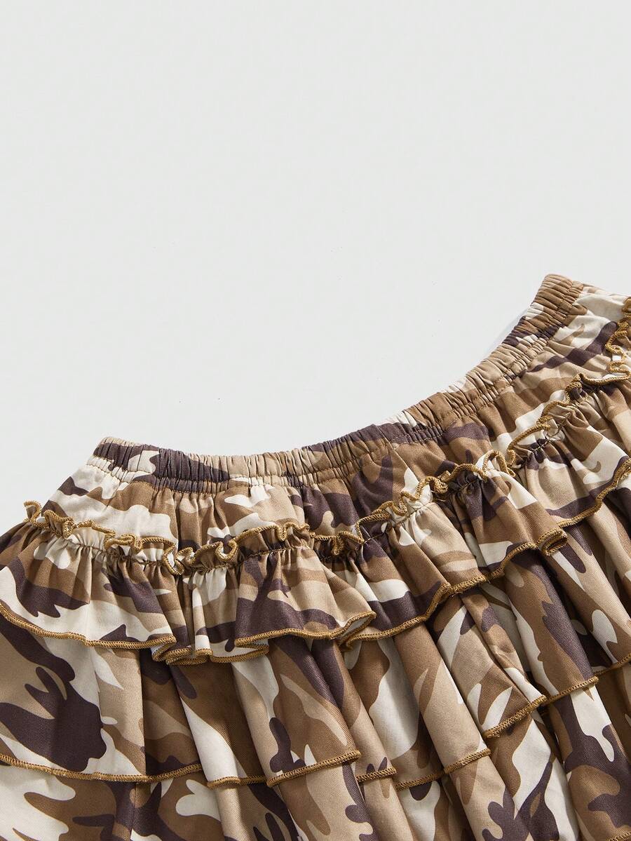 Women's low waist tiered mini skirt featuring ruffled hem layers in knitted stretch fabric.