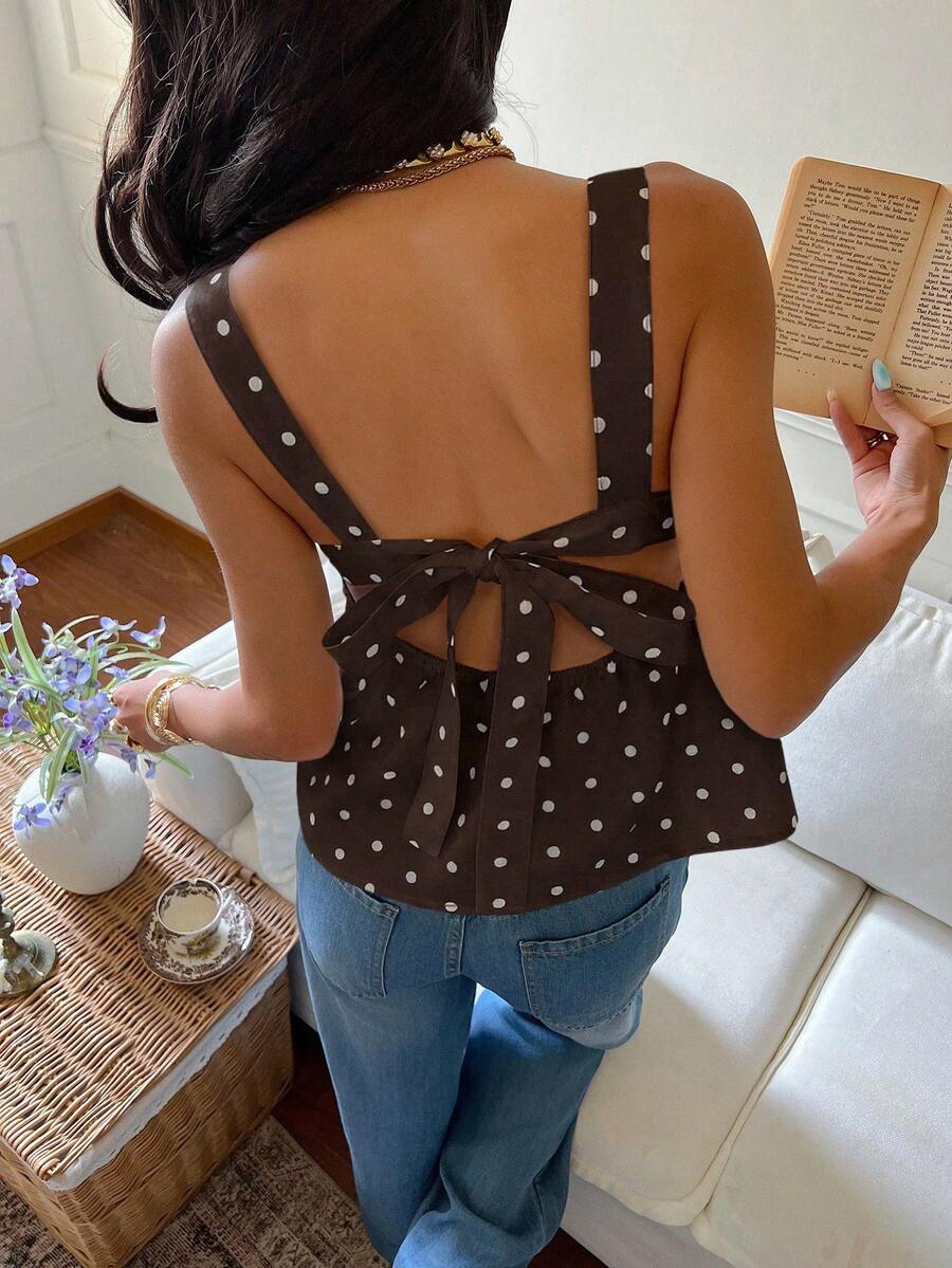 Women's casual polka dot tank top with tie-front knot, strap neckline, backless design, and ruffle flared hem