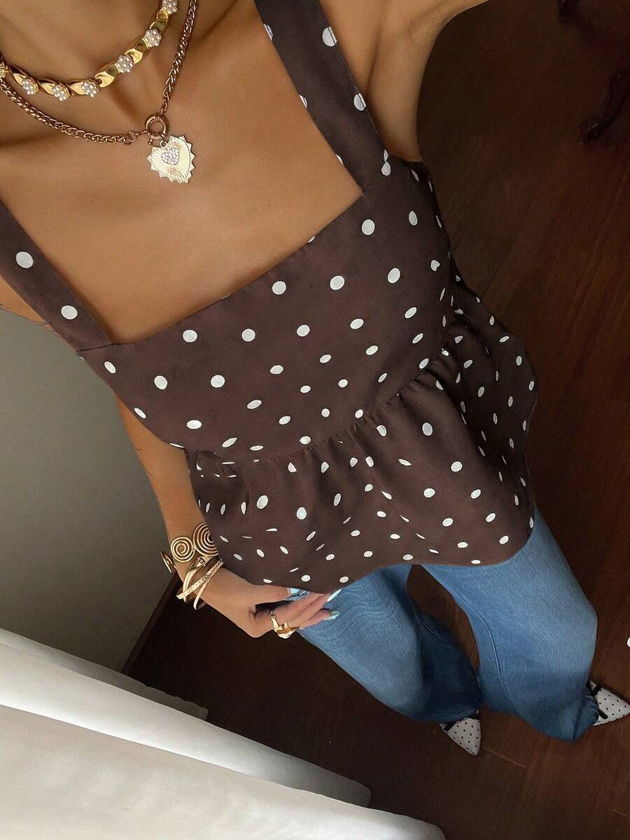 Women's casual polka dot tank top with tie-front knot, strap neckline, backless design, and ruffle flared hem