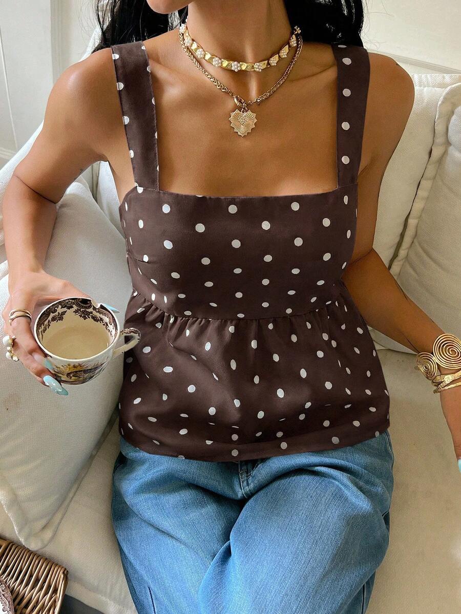 Women's casual polka dot tank top with tie-front knot, strap neckline, backless design, and ruffle flared hem