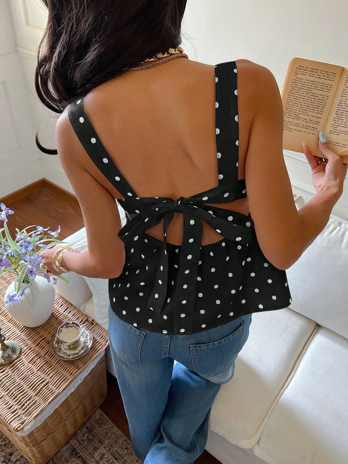 Women's casual polka dot tank top with tie-front knot, strap neckline, backless design, and ruffle flared hem