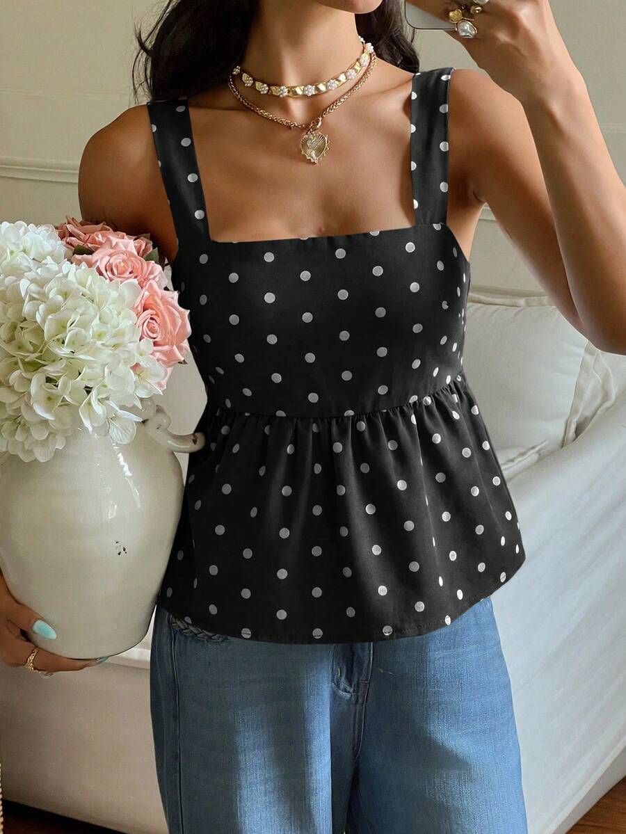Women's casual polka dot tank top with tie-front knot, strap neckline, backless design, and ruffle flared hem
