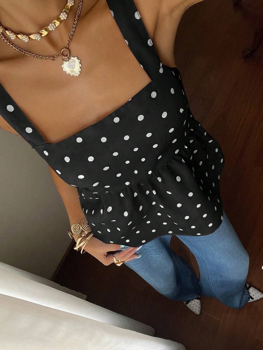 Women's casual polka dot tank top with tie-front knot, strap neckline, backless design, and ruffle flared hem