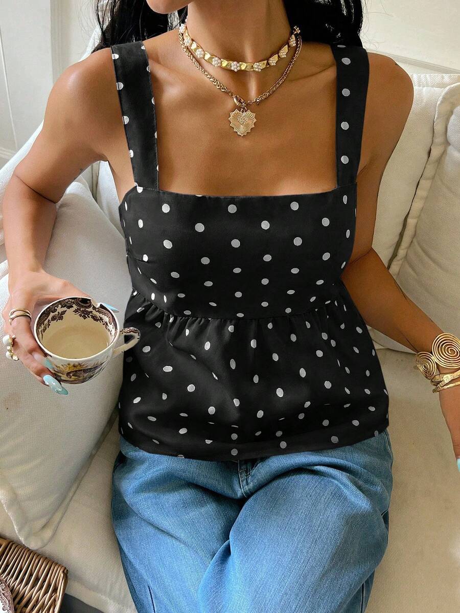 Women's casual polka dot tank top with tie-front knot, strap neckline, backless design, and ruffle flared hem