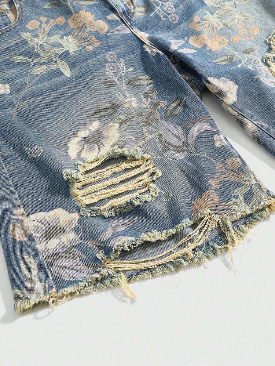 Women's loose wide-leg denim Bermuda shorts featuring vintage animal and paisley print with pockets and zipper fly.