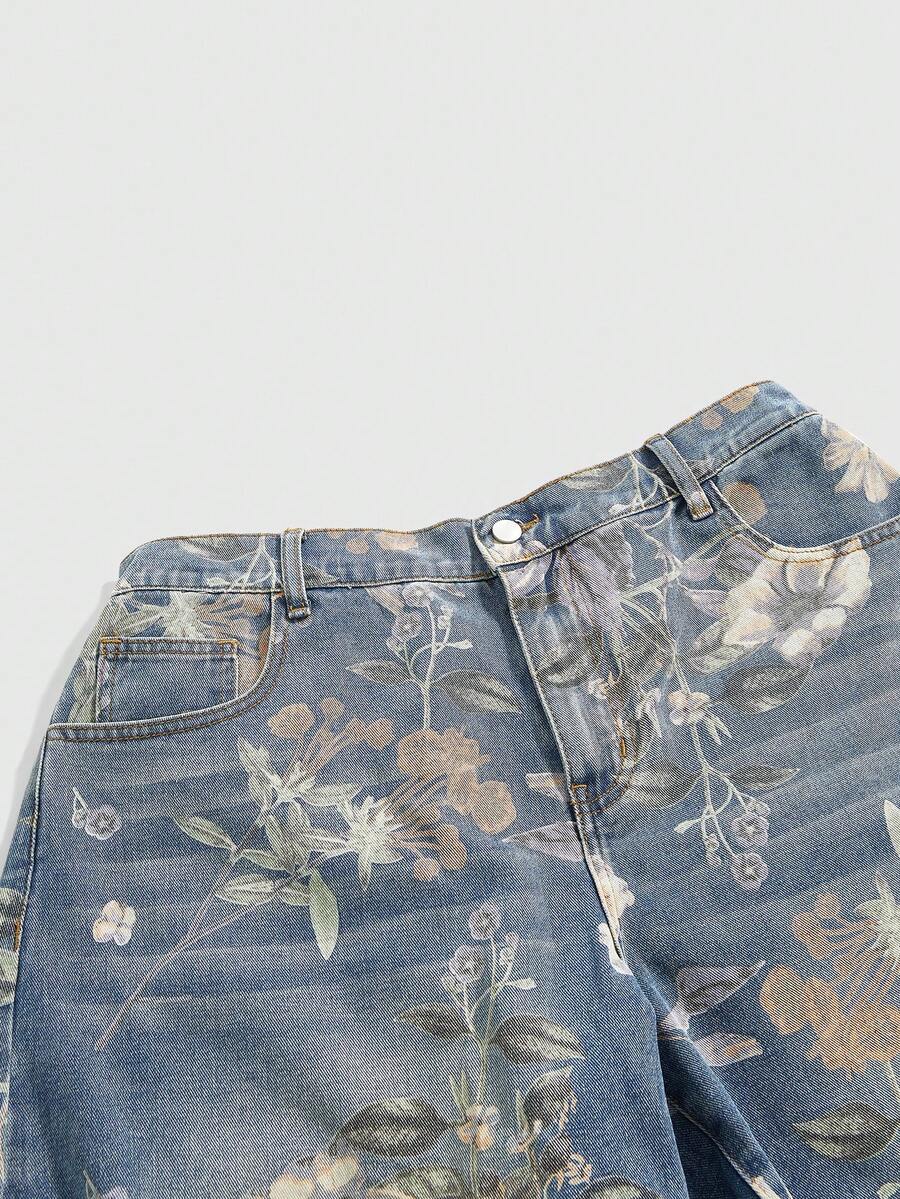 Women's loose wide-leg denim Bermuda shorts featuring vintage animal and paisley print with pockets and zipper fly.