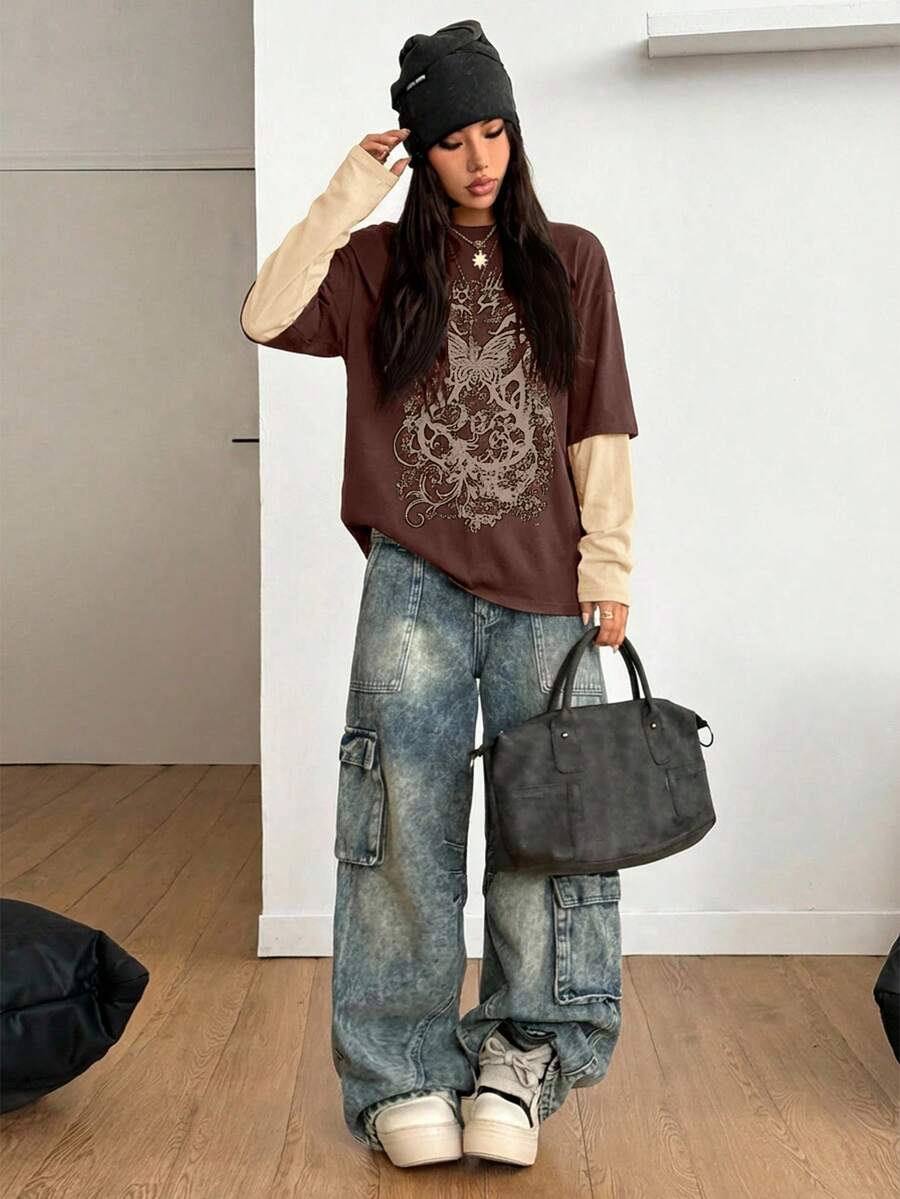 Women's casual graphic long sleeve t-shirt with a round neck, drop shoulder sleeves, and loose relaxed fit.