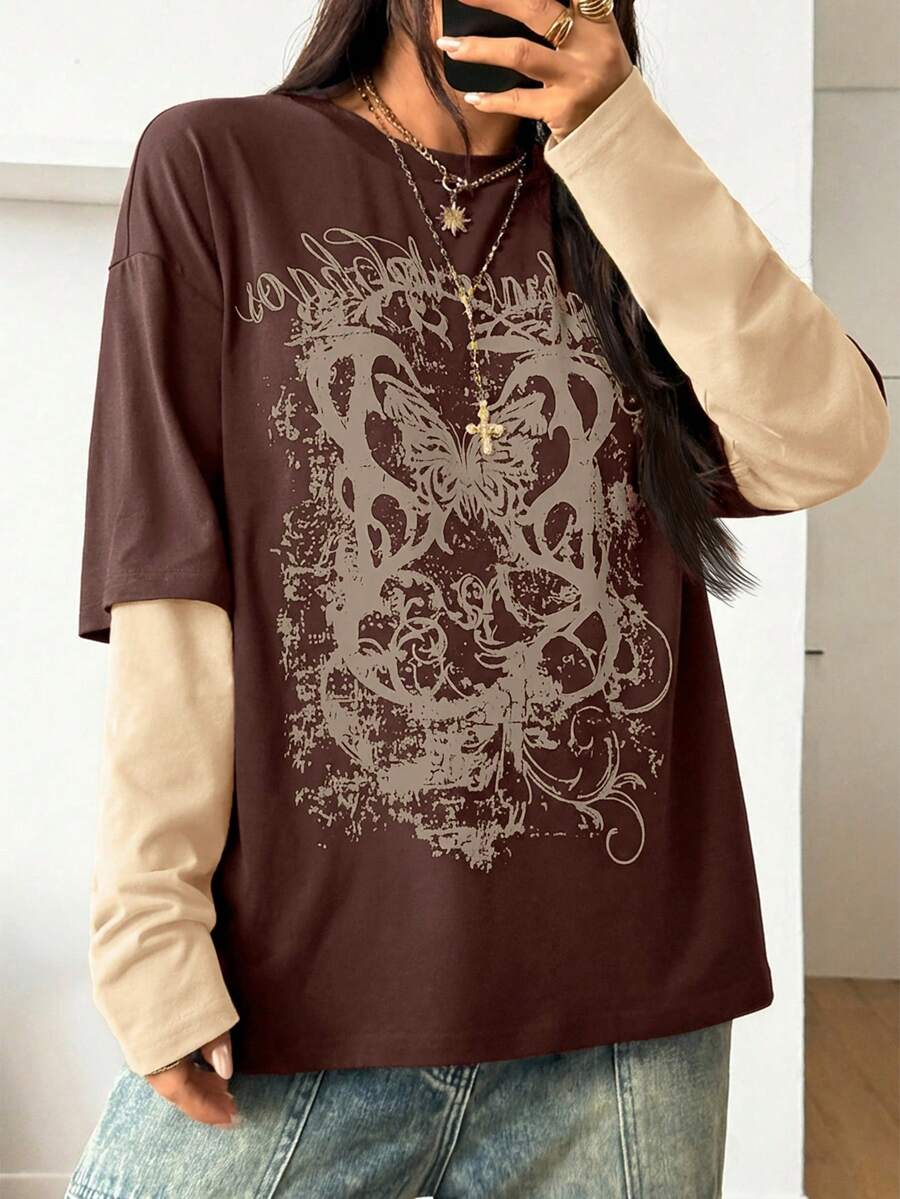 Women's casual graphic long sleeve t-shirt with a round neck, drop shoulder sleeves, and loose relaxed fit.