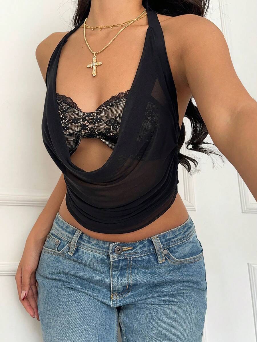 Women's black halter cup-style crop camisole top with a backless bralette design and draped front detail.