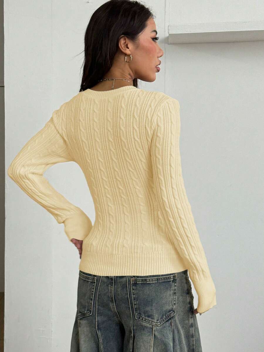 Women's slim fit cable-knit sweater with a V-neckline and long sleeves in solid green rib knit fabric.