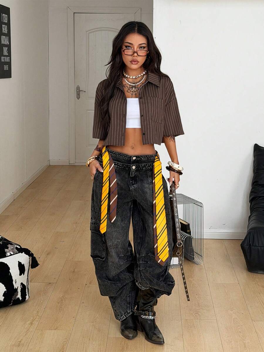 Women's plaid crop shirt with button front, chest pocket, short sleeves, and loose casual fit.