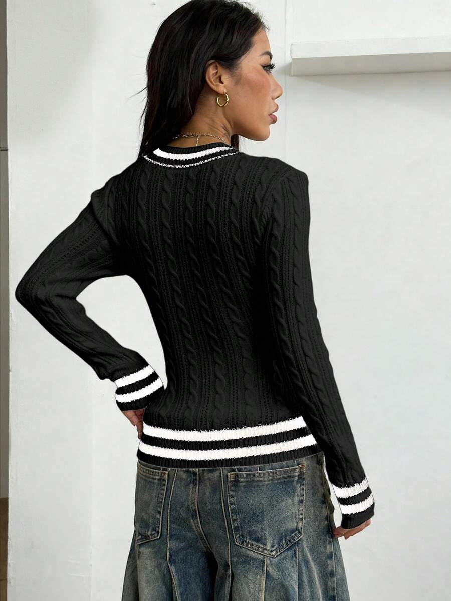 Women's slim fit cable-knit sweater with a V-neckline and long sleeves in solid green rib knit fabric.