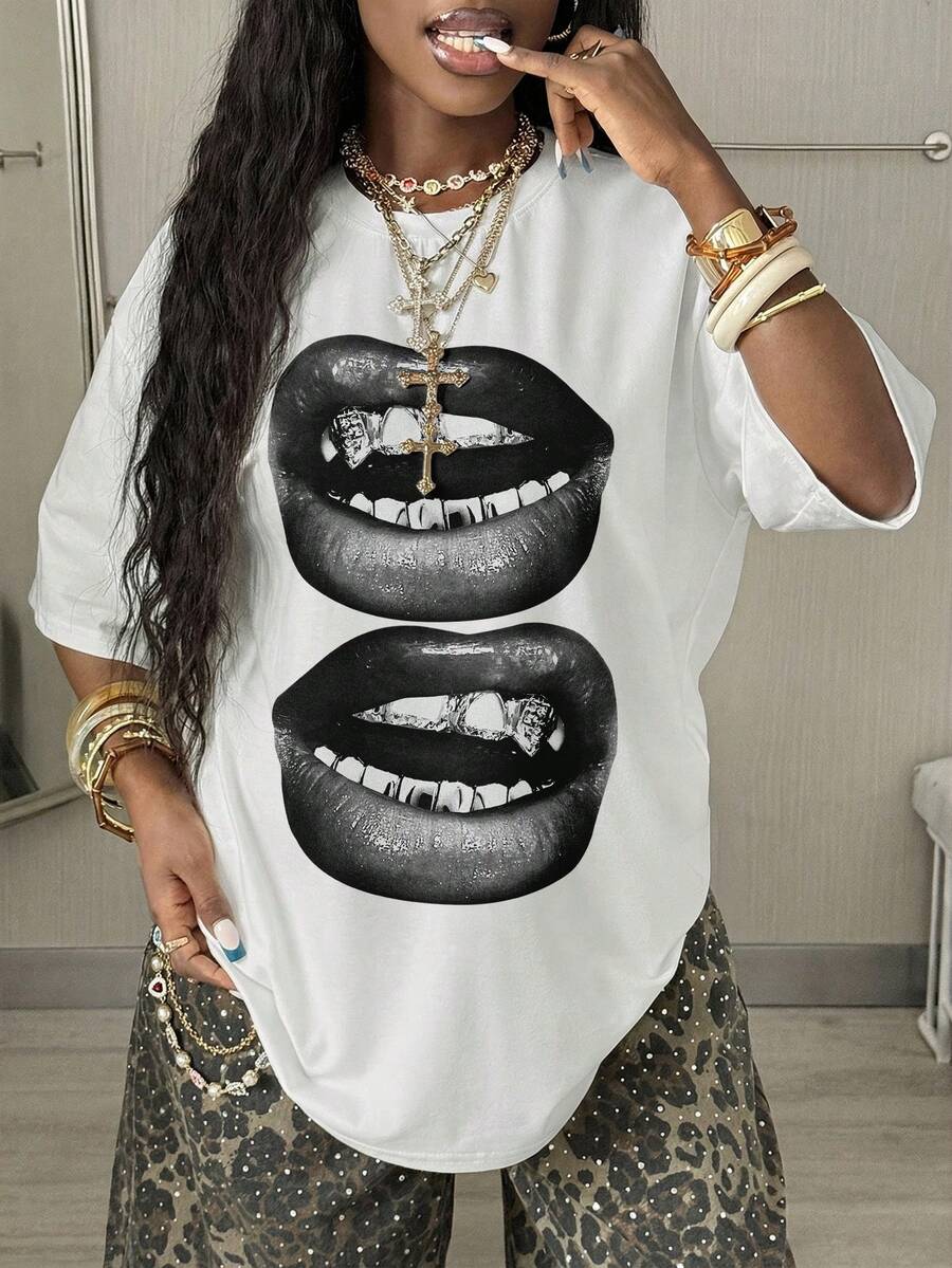 Women's oversized graphic crew neck t-shirt made of 100% white cotton knitted fabric with drop shoulder half sleeves.