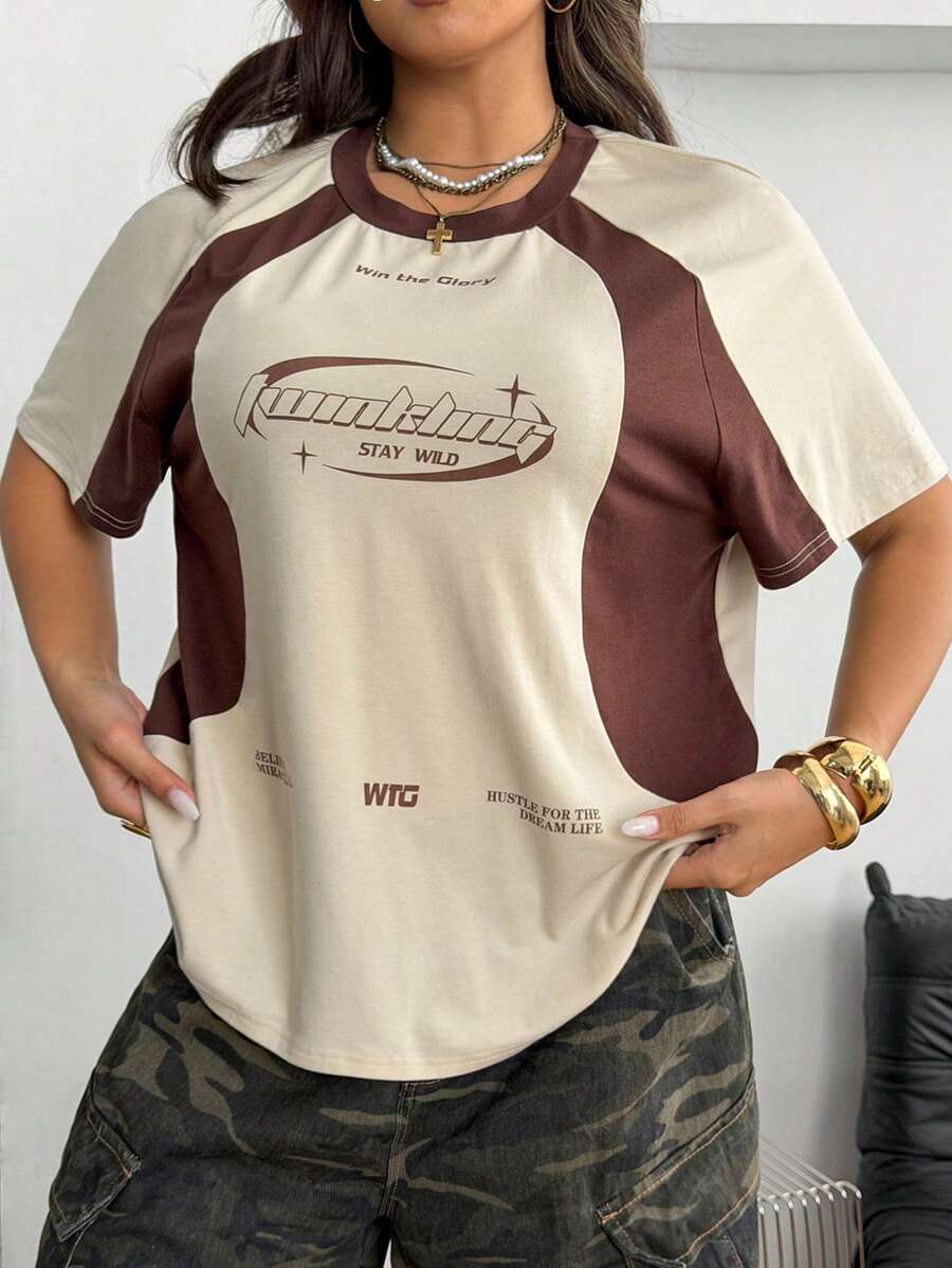 Unisex plus size oversized jersey t-shirt in brown featuring a round neck, short raglan sleeves with contrast binding, and a front letter graphic print.